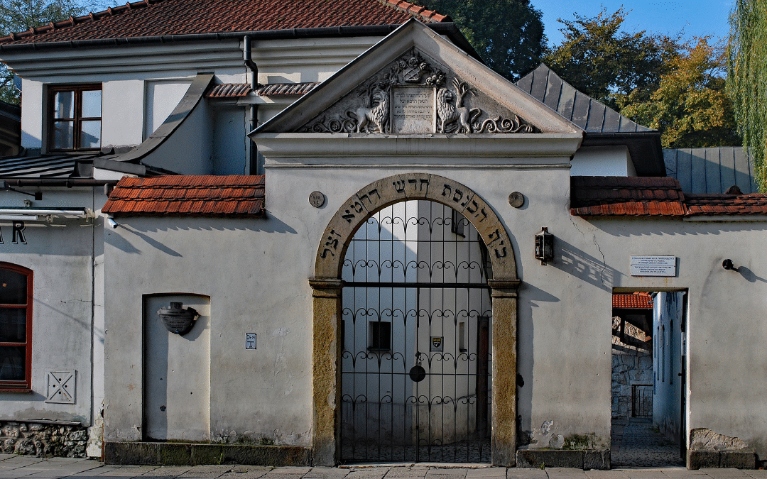 Gate of the Remuh Synagogue and Cemetery in Kraków’s Kazimierz district, with Hebrew lettering above the entrance.