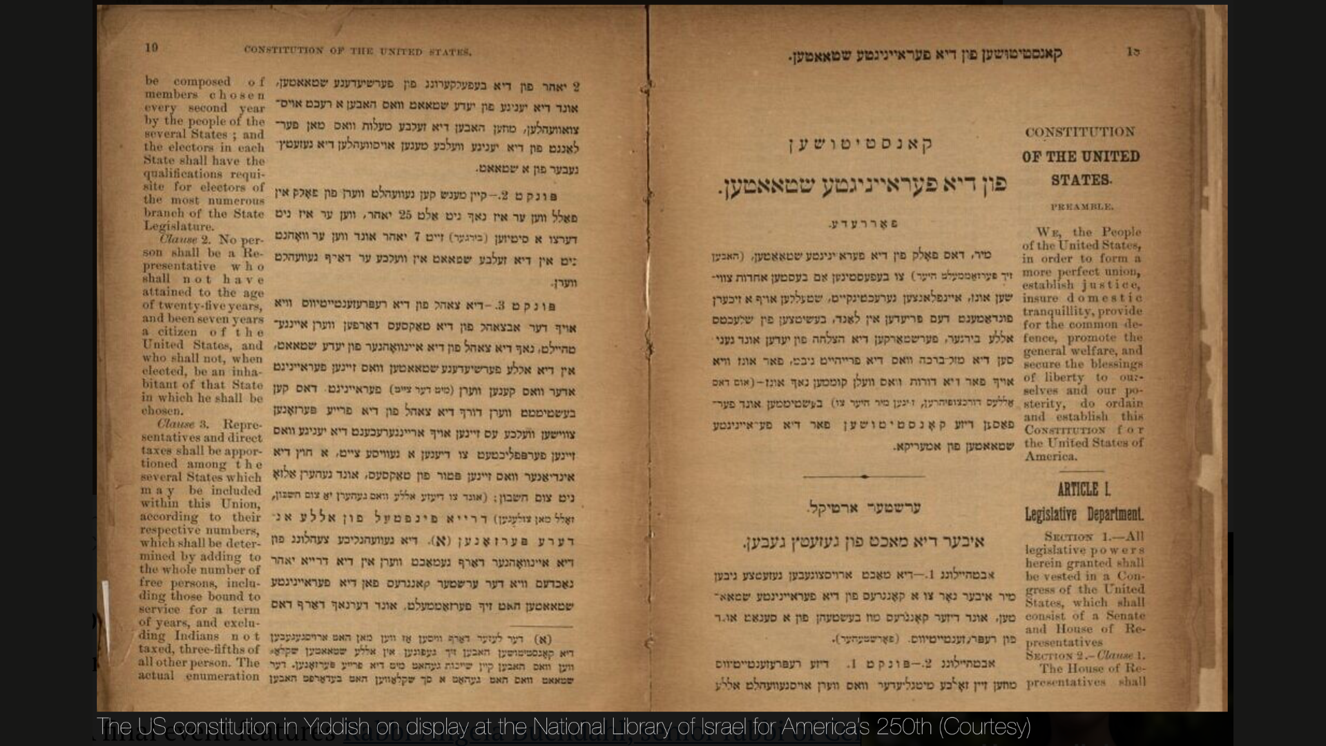 Yiddish Edition of the U.S. Constitution at the National Library of Israel Open book showing the U.S. Constitution printed in Yiddish and English on aged pages.